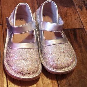 Silver squeaky shoes